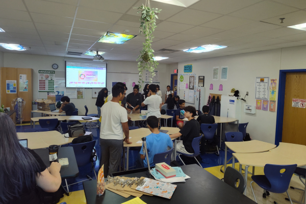 Diverse group of people shaking hands at a business meeting